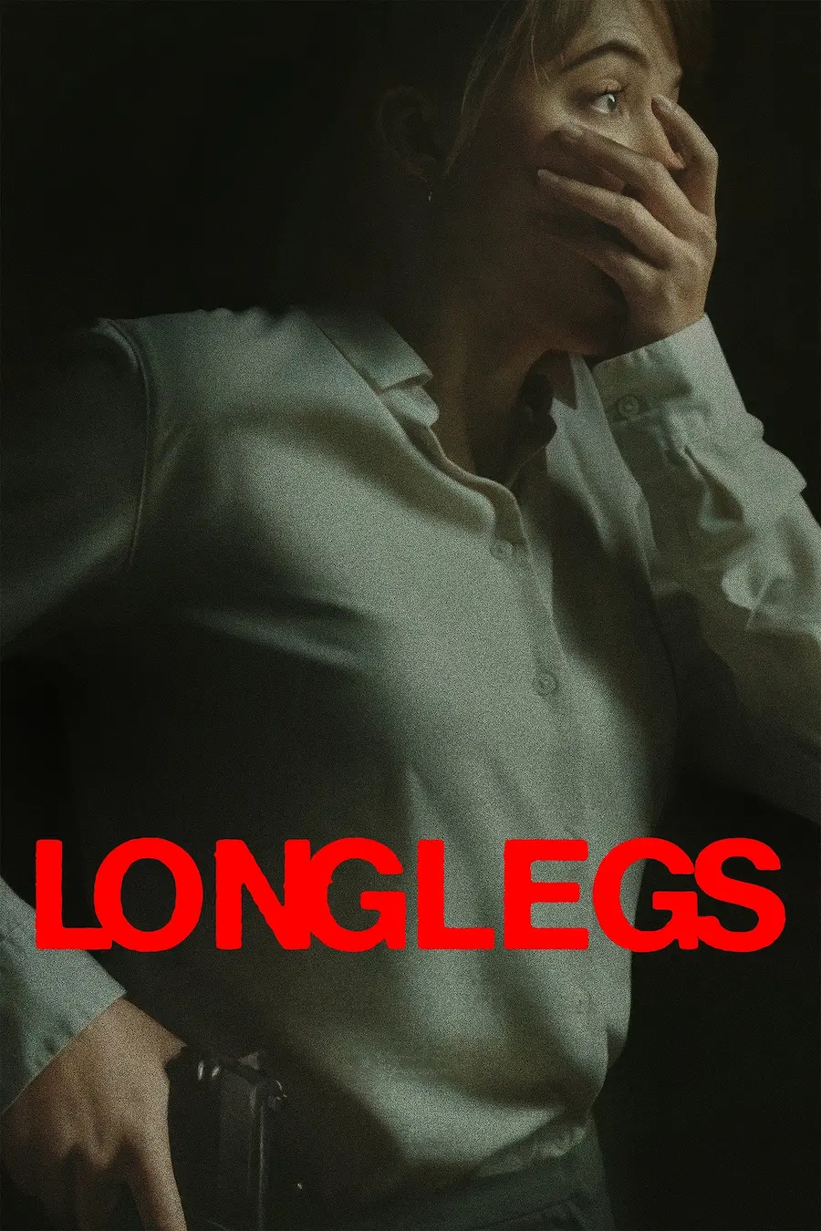 Maika Monroe as Lee Harker staring wide-eyed out a window with her hand over her face on the poster of the movie Longlegs. The title of Longlegs is also on the poster.